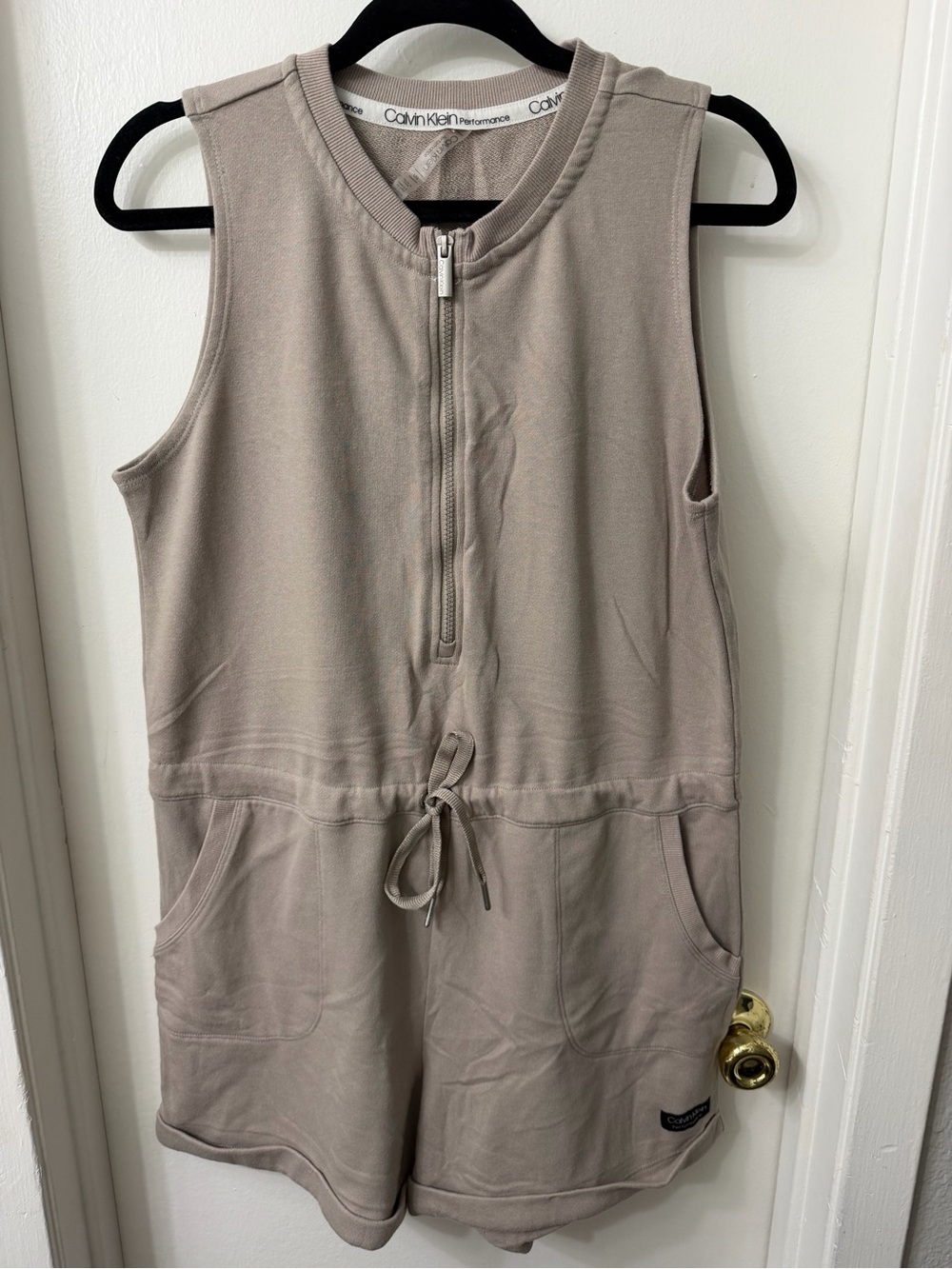 Calvin Klein Performance Sleeveless Zip Romper in Taupe Beige